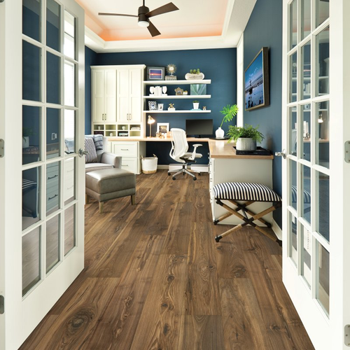 Living room with laminate flooring - Morena Bluffs- Cliffside Pecan